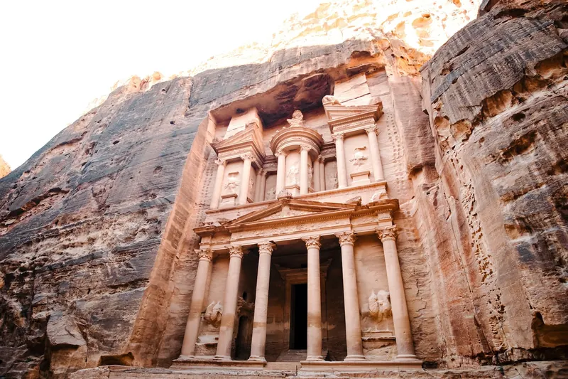 Photograph of the Treasury at Petra, Jordan, in a travel interface example